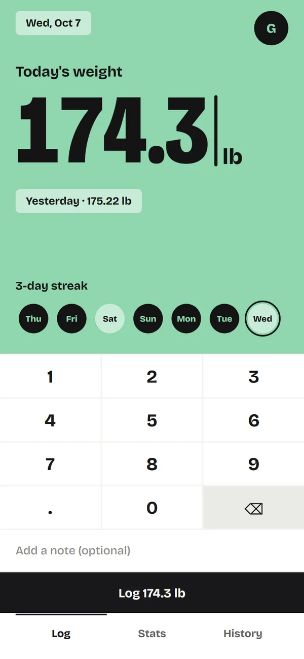Weightmark's Log tab in Vibrant mint: typing today's weight on the keypad, under the week's streak